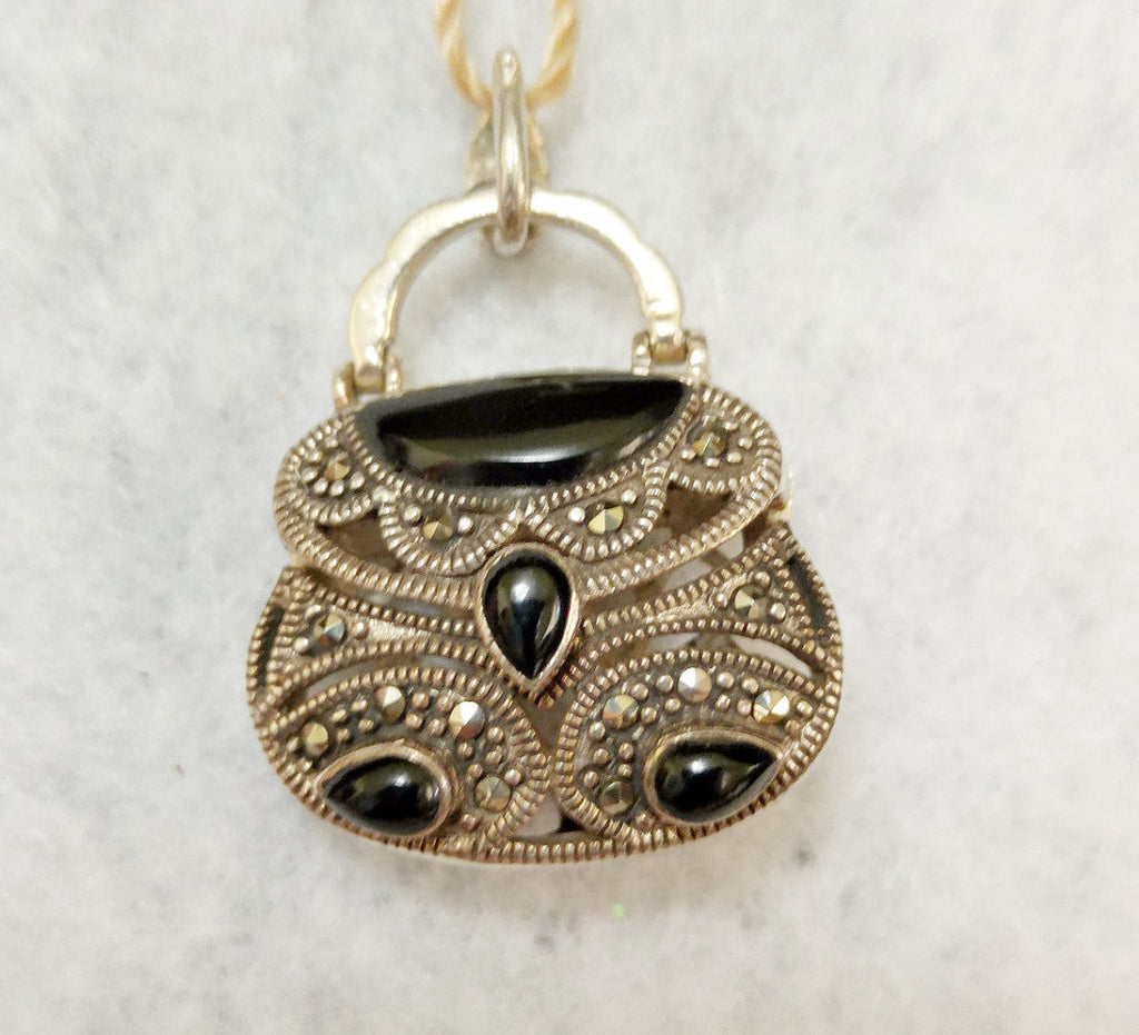 STERLING SILVER, ONYX AND MARCASITE PENDANT